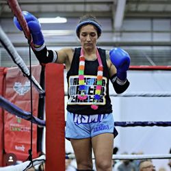 California Martial Athletics - Tina seals the ring before her fight.