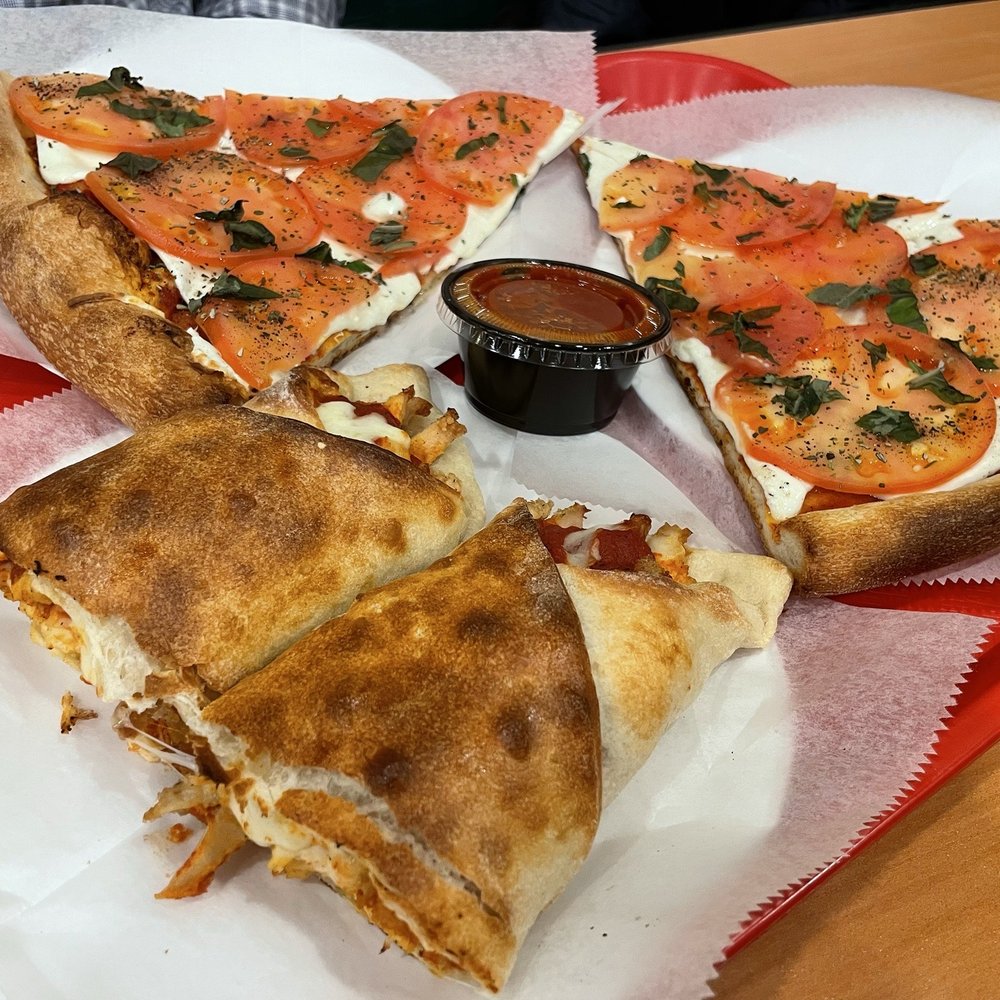 Rosa's Pizza - Chicken roll and fresh tomato slice. Delicious!! - Pizza Near Me - Ridgewood, New York Rosa's Pizza - Chicken roll and fresh tomato slice. Delicious!! - Pizza Near Me - Ridgewood, New York