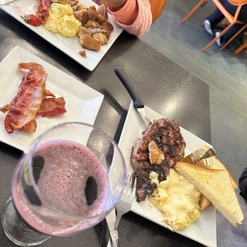 Mango Mangeaux - Biggie 6/10 with grape juice, side of bacon and kids French toast - New American Near Me - Hampton, Virginia Mango Mangeaux - Biggie 6/10 with grape juice, side of bacon and kids French toast - New American Near Me - Hampton, Virginia