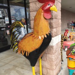 Nic-Nuc Creations - Giant metal chicken out front