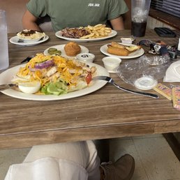 Chicken salad, chopped bbq, French fries, mashed potatoes, corn bread and Texas toast
