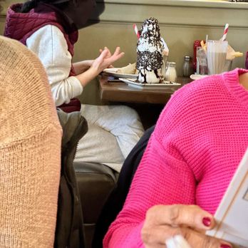 Mt. Kisco Diner - One of their famous shakes, with a normal person next to it for reference. - Diners Near Me - Mount Kisco, New York Mt. Kisco Diner - One of their famous shakes, with a normal person next to it for reference. - Diners Near Me - Mount Kisco, New York