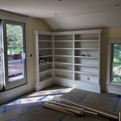 Empress Painting & Drywall - Beautiful custom shelves painted with 3 coats of simply white and yellow walls. Ceiling,trim,shelves,and walls painted with Benjamin Moore
