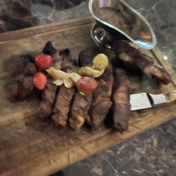 Double Cut Steak House - Special bone in rib-eye. Horribly blurry but wanted to share the evidence - Steakhouses Near Me - Round Rock, Texas Double Cut Steak House - Special bone in rib-eye. Horribly blurry but wanted to share the evidence - Steakhouses Near Me - Round Rock, Texas