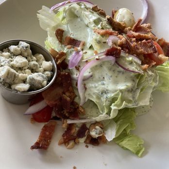 Campbell’s Pub & Veranda - Happy hour wedge salad with plenty - New American Near Me - Chelan, Washington