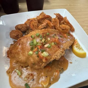 Nuttin Betta - Signature plate: Fried Catfish with Crawfish Etouffee over dirty rice and fried shrimp. - Seafood Near Me - San Antonio, Texas