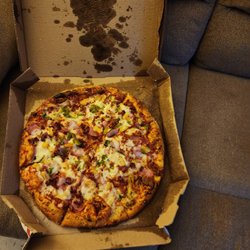 Domino's Pizza - Box falling apart from being wet and this is how it was delivered