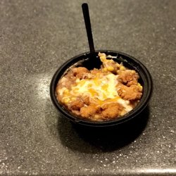 KFC - Famous bowl (mashed potatoes, gravy, corn, popcorn chicken, cheese).