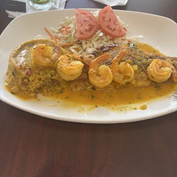 El Nuevo Acuario - Red snapper filet with creole sauce and trifongo. Shrimp added - Seafood Near Me - Punta Cangrejo, Puerto Rico El Nuevo Acuario - Red snapper filet with creole sauce and trifongo. Shrimp added - Seafood Near Me - Punta Cangrejo, Puerto Rico