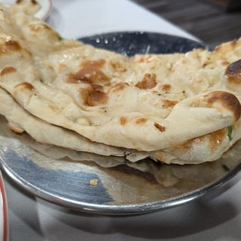 Cafe India - The bread that they serve the Indian bread. I forgot the name of it but it's so good. - Indian Near Me - Memphis, Tennessee