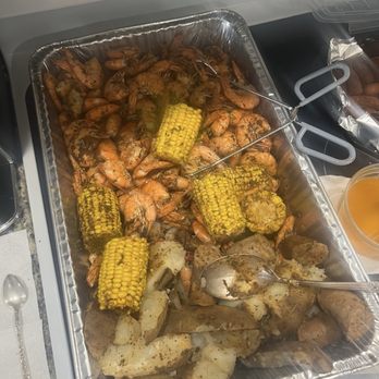 Boro Restaurant And Bar - large tray low country seafood boil shrimp corn potato italian sausage - Tapas Bars Near Me - Swansboro, North Carolina