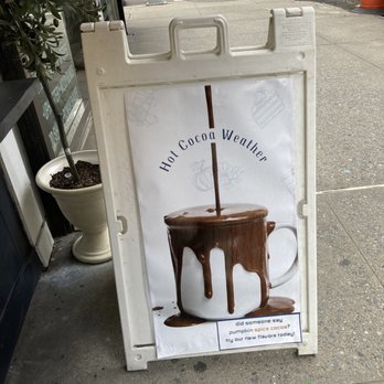 Eleni’s Goods - Sandwich board with hot chocolate - Desserts Near Me - New York, New York