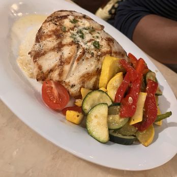 Monty's Sunset - South Beach - the Grilled Mahi Mahi, served with sunset rice, veggies, and lemon garlic butter. - Seafood Near Me - Miami Beach, Florida