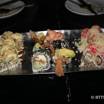 Coast Sushi Bar - Left-Right: White Dragon, Spider Roll, & King Crab - Sushi Bars Near Me - Chicago, Illinois