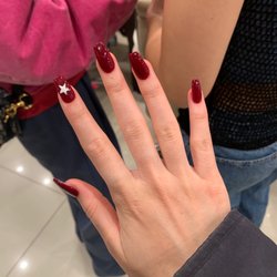 Wistaria Nail Spa - Dip nail with star design