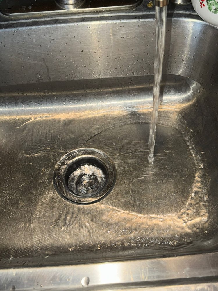 Slide of The Sewer Guys