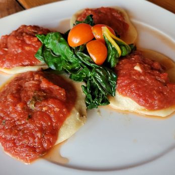 Ravens' Restaurant - Ravens Ravioli* - Hemp & sunflower ricotta stuffed house-made ravioli, marinara, braised garden greens - Vegan Near Me - Mendocino, California Ravens' Restaurant - Ravens Ravioli* - Hemp & sunflower ricotta stuffed house-made ravioli, marinara, braised garden greens - Vegan Near Me - Mendocino, California