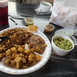 Catrina Fresh Mex - Chorizo and eggs, refried beans, potatoes, corn tortilla and guac