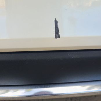 Touch Up Specialist - Garage door damage. - Body Shops Near Me