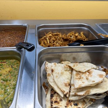 Charminar Biryani House - Mixed Pakora & Naan business. It was 'Naan' of my business how many calories the Naan bread had lol. - Indian Near Me - Troy, Michigan