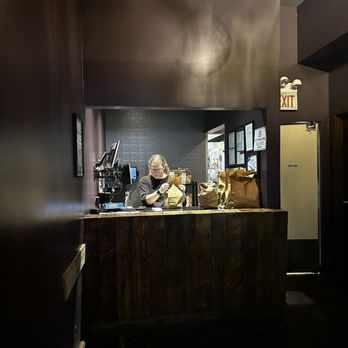 Gotham Bagels - a woman behind the counter - Bagels Near Me - Chicago, Illinois