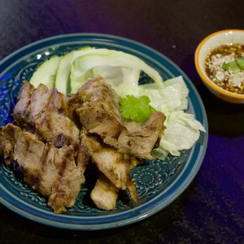 Sabay - BBQ Pork: Tender Pork marinated in BBQ sauce with Thai Style Grilling. Offering a savory start to your meal. - Thai Near Me - Elmhurst, New York Sabay - BBQ Pork: Tender Pork marinated in BBQ sauce with Thai Style Grilling. Offering a savory start to your meal. - Thai Near Me - Elmhurst, New York