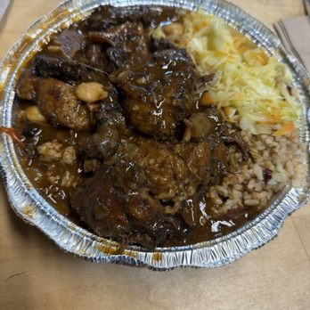 Jamaica House - Oxtail on rice and peas with cabbage - Caribbean Near Me - Richmond, Virginia Jamaica House - Oxtail on rice and peas with cabbage - Caribbean Near Me - Richmond, Virginia