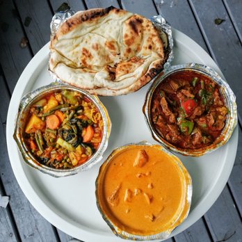 Delhi Kabab - Counterclockwise: Naan, vegetable curry, butter chicken and lamb boohna! All delicious!! - Indian Near Me - Brossard, Quebec Delhi Kabab - Counterclockwise: Naan, vegetable curry, butter chicken and lamb boohna! All delicious!! - Indian Near Me - Brossard, Quebec