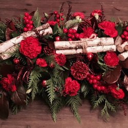Flowers On 50th - Red table design. Let us create a table scape for your dining room or living room.