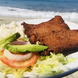 El Salvador - Empanizado "fish steak" YUM!!! Fresh dorado breaded with salad & rice salsa on the side YUM YUM YUM!!!