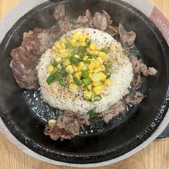 Pepper Lunch - Irvine Spectrum - Look at the rice to meat ratio????   It's all rice and corn. TBH, there was one real piece of meat and the rest was scraps. - Teppanyaki Near Me - Irvine, California