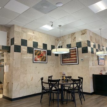 Romilo's - Restaurant and seating area - Greek Near Me - Severna Park, Maryland