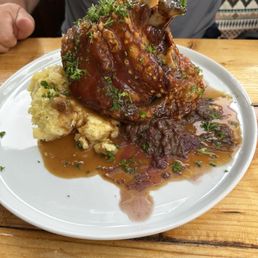 Pork shank with potatoes and red cabbage Pork shank with potatoes and red cabbage