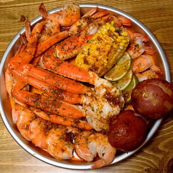 Ocean Crab - crab legs, corn, potatoes, and corn on a plate - Seafood Near Me - Philadelphia, Pennsylvania