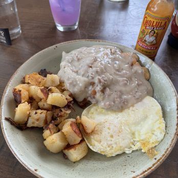 First Watch - Biscuit and sausage gravy w/ potatoes and two eggs any style. So so soo good - Breakfast & Brunch Near Me - Windsor, Colorado