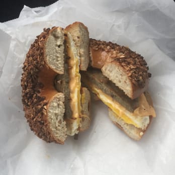 Schmagel's Bagels - The sausage egg n cheese on an onion bagel - Bagels Near Me - Saint Augustine, Florida