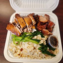 Lunch Plate: Roast Chicken and Char Siu over rice (sometimes fried, mostly plain white)