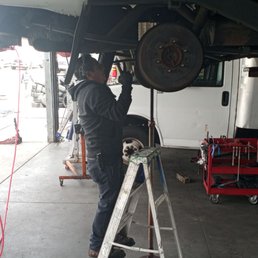 The worker is working on my rear shocks. The worker is working on my rear shocks.