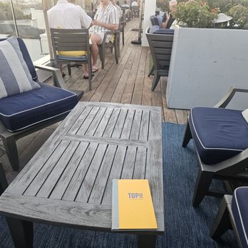Topside Roof Deck - Outside table - Cocktail Bars Near Me - Newport Beach, California Topside Roof Deck - Outside table - Cocktail Bars Near Me - Newport Beach, California