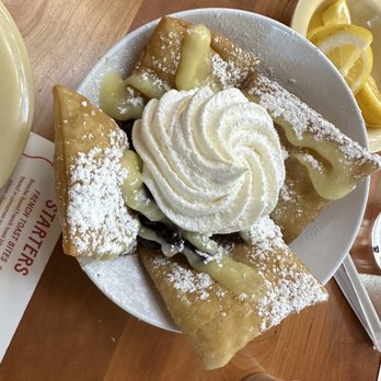 Ruby Sunshine Homewood - Seasonal beignets $7 with blueberries and lemon curd - Breakfast & Brunch Near Me - Birmingham, Alabama Ruby Sunshine Homewood - Seasonal beignets $7 with blueberries and lemon curd - Breakfast & Brunch Near Me - Birmingham, Alabama
