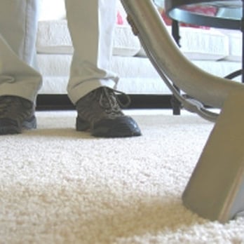 AAA Carpet Cleaning - a person using a vacuum cleaner - Carpet Cleaning Near Me AAA Carpet Cleaning - a person using a vacuum cleaner - Carpet Cleaning Near Me