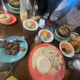 Chicken in mushroom sauce, side maduros, most dishes come with a salad. Sancocho is a good portion!