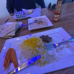 Hummus plate, lamb kebob plate and a gyro wrap lightly doused with their hot sauce---Reds buffalo sauce. Hummus plate, lamb kebob plate and a gyro wrap lightly doused with their hot sauce---Reds buffalo sauce.