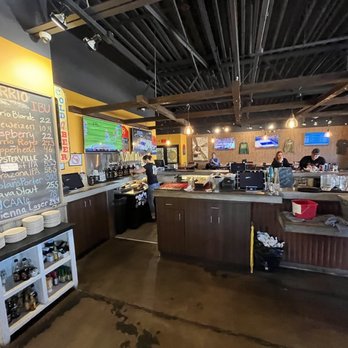 Barrio Brewing - Bar area and beer board - American Near Me - Mesa, Arizona Barrio Brewing - Bar area and beer board - American Near Me - Mesa, Arizona