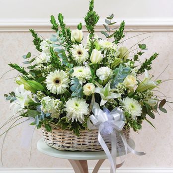 Floral Impressions Design Studio - Winter Wonderland arranged in a white washed wicker basket as a stunning visual for all to see. - Floral Designers Near Me - Gardena, California Floral Impressions Design Studio - Winter Wonderland arranged in a white washed wicker basket as a stunning visual for all to see. - Floral Designers Near Me - Gardena, California