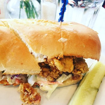 Stanley - Fried oyster Po' boy. With coleslaw and a pickle- so good! - Breakfast & Brunch Near Me - New Orleans, Louisiana Stanley - Fried oyster Po' boy. With coleslaw and a pickle- so good! - Breakfast & Brunch Near Me - New Orleans, Louisiana