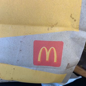 McDonald's - a paper bag with a mcdonald's logo - Burgers Near Me - Loganville, Georgia McDonald's - a paper bag with a mcdonald's logo - Burgers Near Me - Loganville, Georgia
