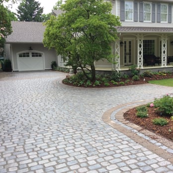Tree Amigos Landscaping - a driveway in a residential neighborhood - Gardeners Near Me - Virgil, Ontario Tree Amigos Landscaping - a driveway in a residential neighborhood - Gardeners Near Me - Virgil, Ontario