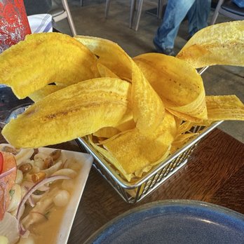 Puerto 27 Peruvian Kitchen & Pisco Bar - Iconic Plantain Chips - Peruvian Near Me - Pacifica, California Puerto 27 Peruvian Kitchen & Pisco Bar - Iconic Plantain Chips - Peruvian Near Me - Pacifica, California