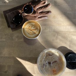 Cappuccino with oat milk, and Iced latte with oat milk Cappuccino with oat milk, and Iced latte with oat milk